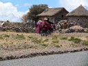 3 people on motor bike